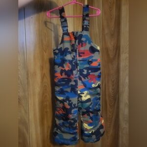 Hanna Andersson Kids Camo Snow Bibs in Blue, Green, Orange, Yellow